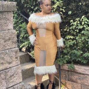 Woman modeling Gold Dress with fur